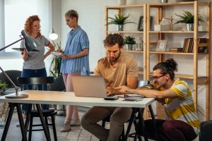 Young coworkers working together on new project in the office